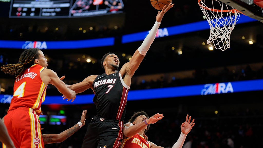 Giannis Antetokounmpo scores 24 points, 18 rebounds as the Heat beat the Hawks 129-117 for first win — Boca Raton Sports news