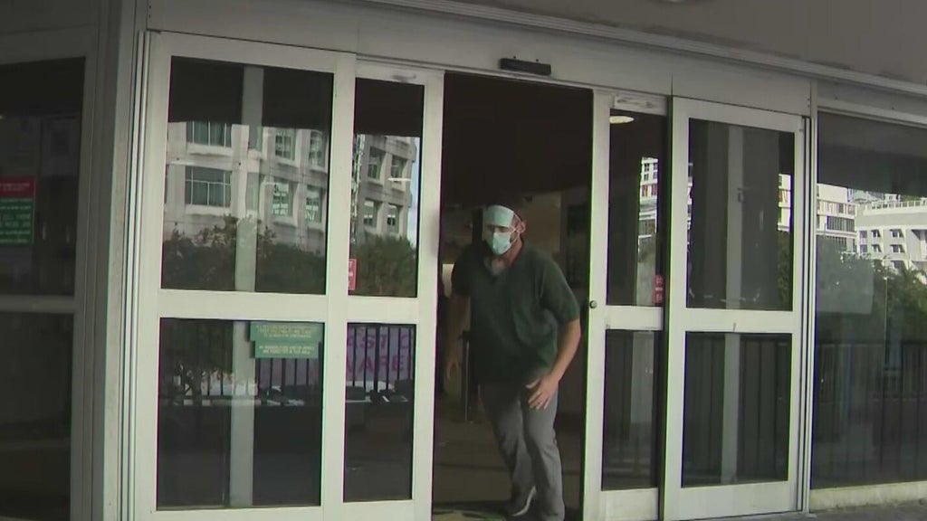 Suspended Broward officer runs out of jail after arrest for alleged identity theft on dead man — CBS Miami, Boca Raton Community news
